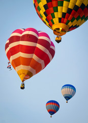Hot air balloons rising in the sky at the International Balloon Festival of Saint Jean Sur Richelieu, Quebec, Canada