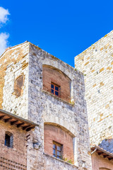Fototapeta na wymiar Gros plan sur les tours de San Gimignano, Italie 