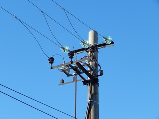 Electric pole with wires. Photo of an electric pylon.