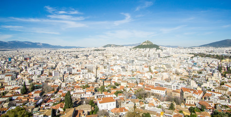 A beautiful sunny day at the acropolis hill in Athens Greece , this iconic Parthenon is just...