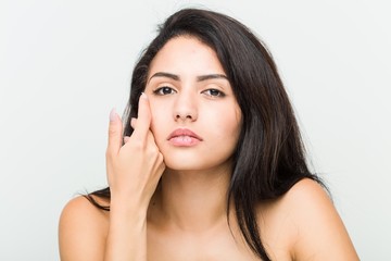 Fototapeta premium Close up of a young beautiful and natural hispanic woman