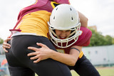 Photo of two female rugby athletes on playground