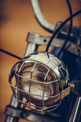 Fototapeta na wymiar Vintage motorcycle headlight