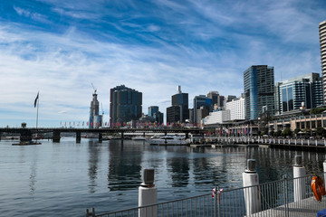 Fototapeta premium Sydney waterfront with boats at marina and skyscrapers as backdrop