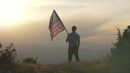 American patriot is holding United States flag