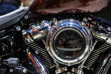 Shiny chrome motorcycle engine with twin piston