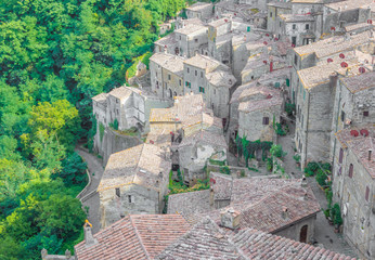 Sorano (Italy) - An ancient medieval hill town hanging from a tuff stone in province of Grosseto, Tuscany region, know as the Little Matera.