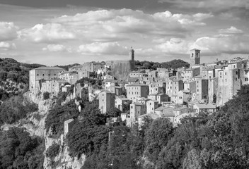 Sorano (Italy) - An ancient medieval hill town hanging from a tuff stone in province of Grosseto, Tuscany region, know as the Little Matera.