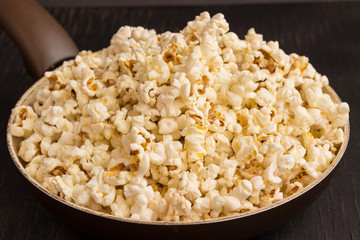 Fried popcorn in a pan, close up