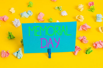 Writing note showing Memorial Day. Business concept for To honor and remembering those who died in military service Colored crumpled paper empty reminder white floor clothespin