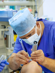 Anesthesiologist performs tracheal intubation for patient