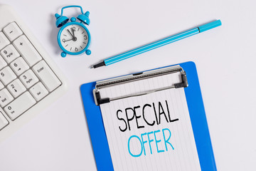 Conceptual hand writing showing Special Offer. Concept meaning Discounted price Markdown Promotional Items Crazy Sale Flat lay above table with clock pc keyboard and note paper