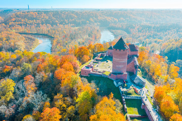 Amazing Aerial View over the Turaida Castle during Golden Hours, Sunset Time, Sigulda, Latvia, Touristic Place, Beautiful Wallpaper - Image - obrazy, fototapety, plakaty