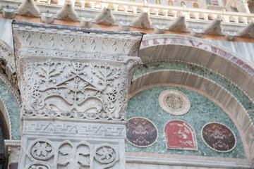 Detail of ornate carved column in St Marks square in Venice