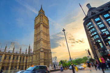 Big Ben, one of the most prominent symbols of both London and England, as shown at night along with the lights of the cars passing by  © Iliya Mitsk