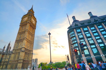 Big Ben, one of the most prominent symbols of both London and England, as shown at night along with the lights of the cars passing by  © Iliya Mitsk
