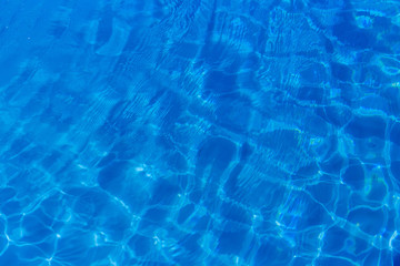 Clear blue water in swimming pool