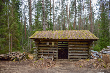 old wooden shed with wooden roof