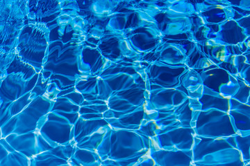 Clear blue water in swimming pool