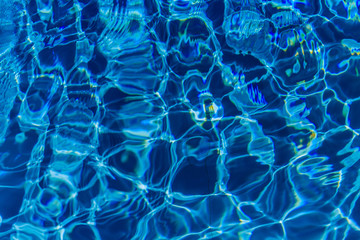 Clear blue water in swimming pool