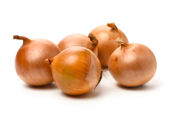 Gold onion vegetable bulbs on white background