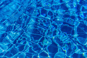 Clear blue water in swimming pool
