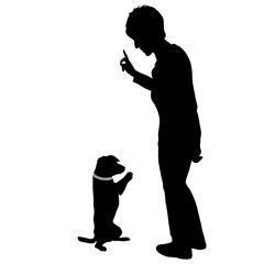 Silhouette of woman and Dog sitting on its hind legs on a white background