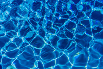 Clear blue water in swimming pool