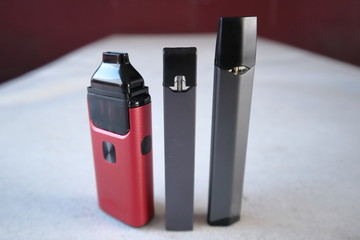 3 different vape pen electronic cigarette devices product shot isolated