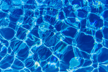 Clear blue water in swimming pool