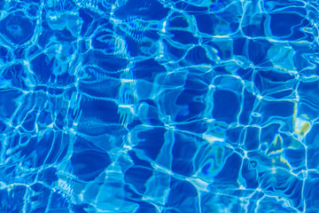 Clear blue water in swimming pool