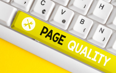 Conceptual hand writing showing Page Quality. Concept meaning Effectiveness of a website in terms of appearance and function White pc keyboard with note paper above the white background
