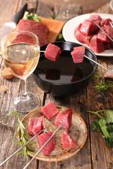 beef fondue, tender prime beef with hot oil and wine