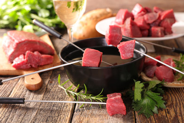 beef fondue, tender prime beef with hot oil and wine