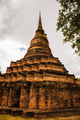 Fototapeta premium Wat Mahathat Temple in the precinct of Sukhothai Historical Park, Wat Mahathat Temple is UNESCO World Heritage Site, Thailand.
