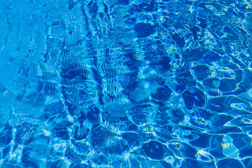 Blue ripped water in swimming pool