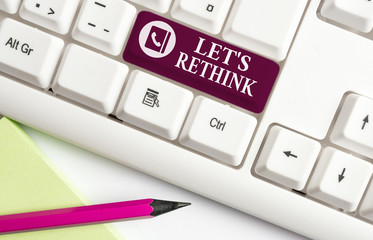 Word writing text Let S Rethink. Business photo showcasing an Afterthought To Remember Reconsider Reevaluate White pc keyboard with empty note paper above white background key copy space