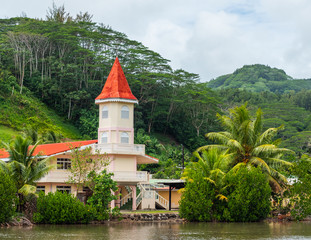 View of the building by the ocean, Raiatea island, French Polynesia.