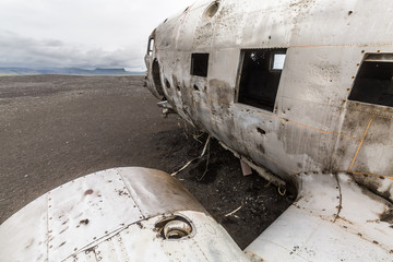 Close up of an old and abandoned plane in a desertic plain in Iceland