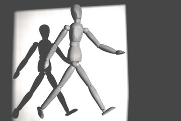 wooden figures of parent and child