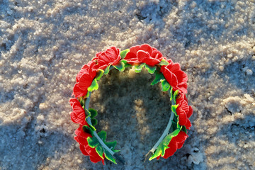 Head jewelry covered with salt crystals.