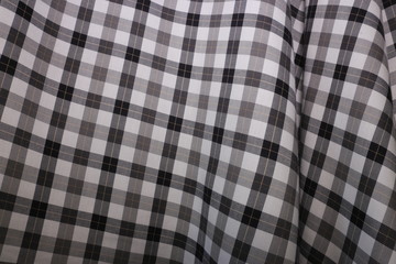 checkered tablecloth on background