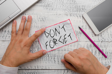 Writing note showing Don T Forget. Business concept for Know by Heart Think Back Fix in the Mind Refresh Memory