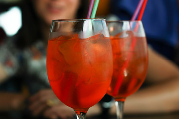 Cool Aperol cocktail overlooking the city. Panorama of Vilnius. Lithuania
