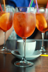 Cool Aperol cocktail overlooking the city. Panorama of Vilnius. Lithuania