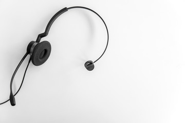 Headphone with microphone on white background - Call center and customer service concept.