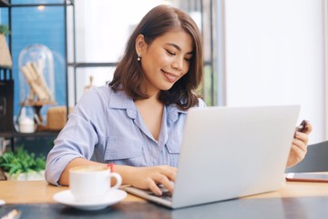 woman working on laptop at home