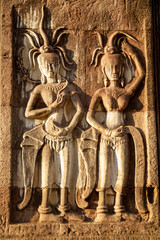 Bas-relief figures carved in stone, Angkor Wat, Cambodia