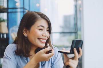 young woman with mobile phone