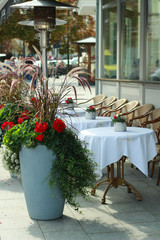 Tables on the street near the cafe. Exterior. Vilnius Lithuania
